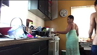 Curvaceous ebony wife gets drilled doggystyle in the kitchen