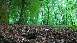 A voyeur watched me pee in the woods. I gave him a handjob and he came on my hairy pussy.